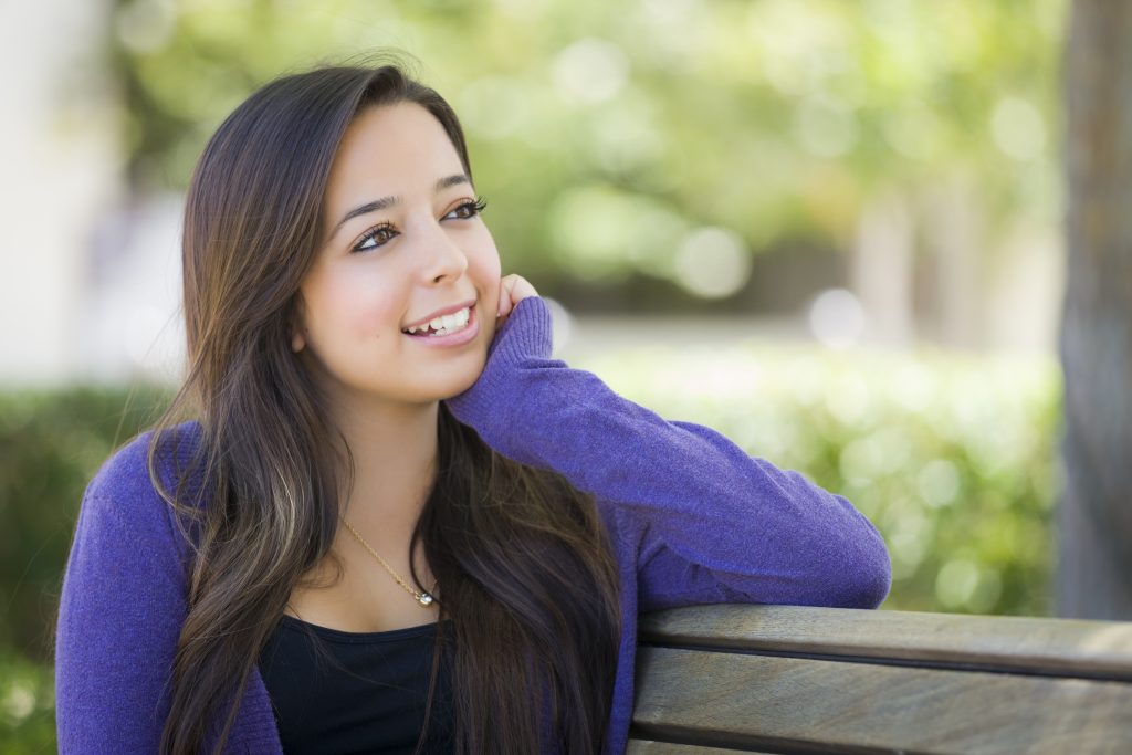 Happy,Mixed,Race,Female,Student,Portrait,On,School,Campus,Bench.